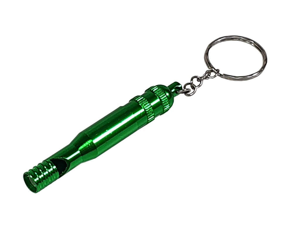 zelená kovová píšťalka na psy